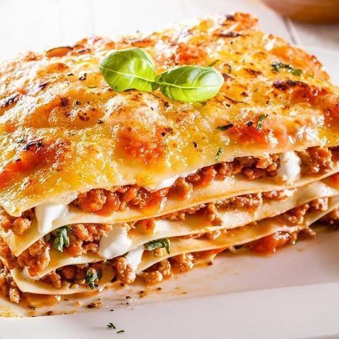 Lasagna with bechamel sauce and lentil ragout